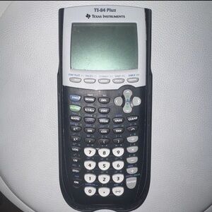 Texas Instruments TI-84 Plus Graphing Calculator in Black and White